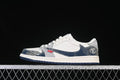 Side view of a white and grey low-top sneaker with dark blue patterned overlays and a dark outsole.
