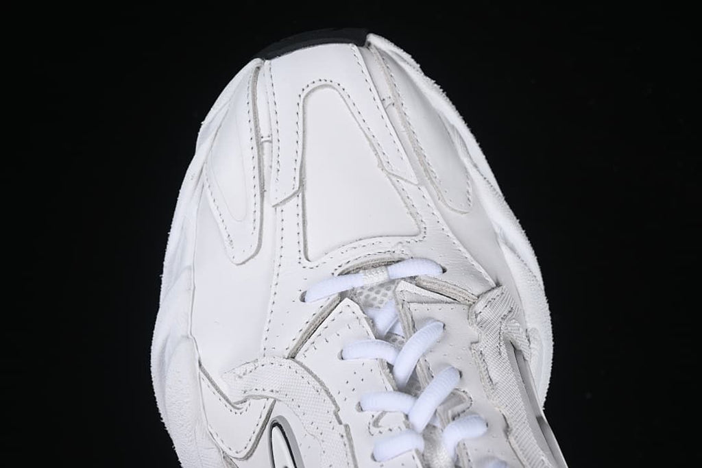 Top-front view of the sneaker showing its rounded toe and laces