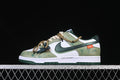 Side view of a white and green low-top Nike Dunk with layered laces