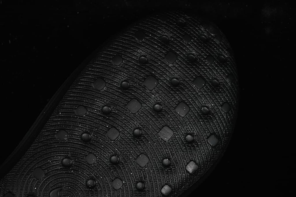 Close-up of the textured, patterned outsole