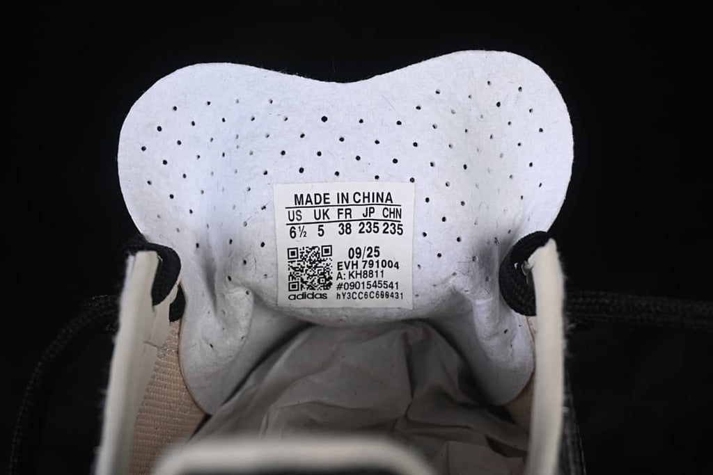 Tongue size label showing US 6.5, UK 5, EU 38, JP 235, and style code KH8811.