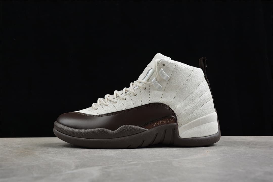 Air Jordan 12 high-top sneaker in sail white and dark brown, side view