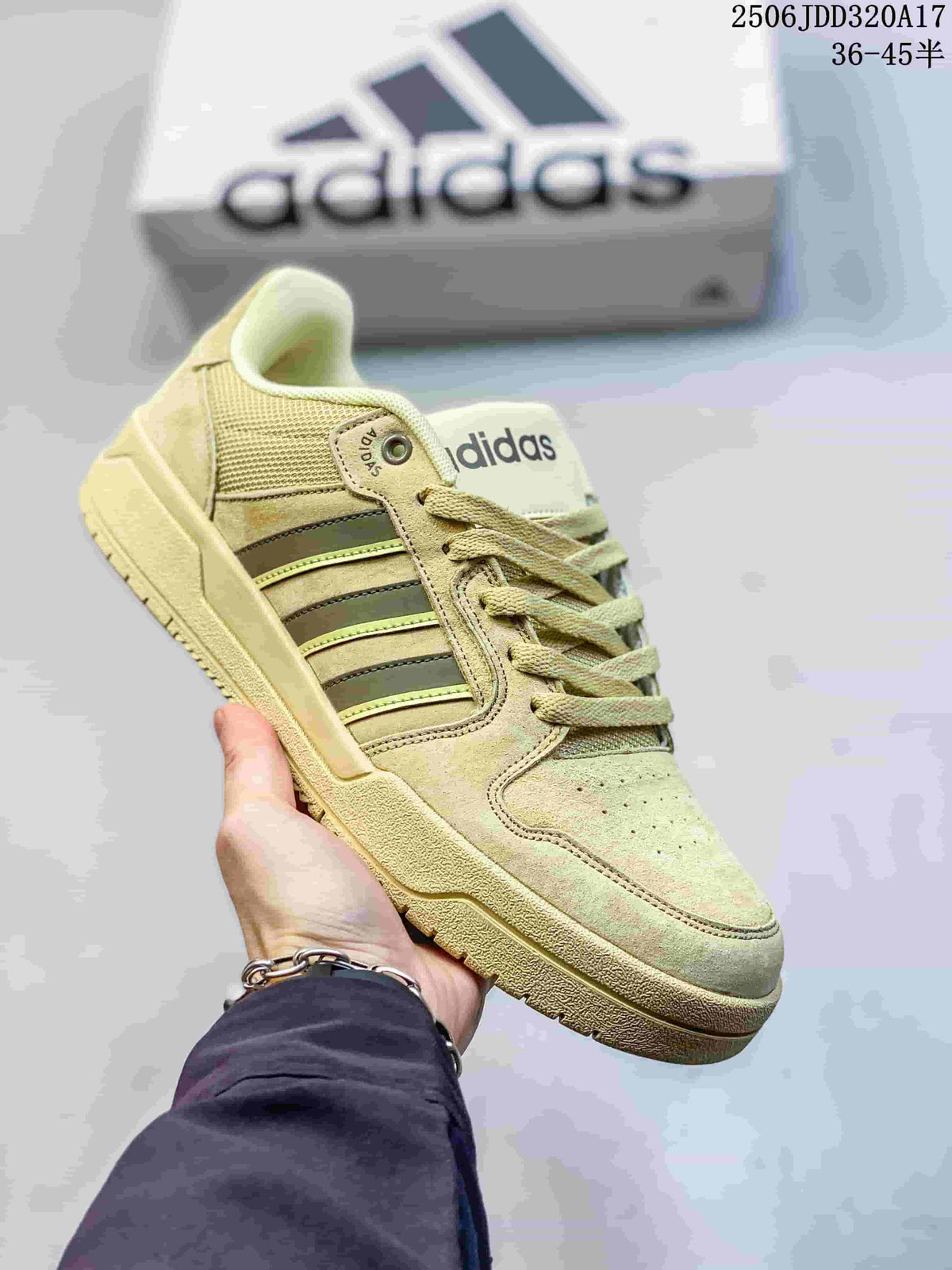 Light neutral adidas Entrap sneaker with subdued stripes and a tonal outsole
