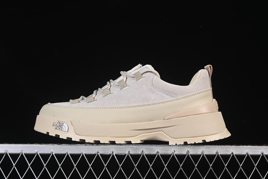 Side profile of the sneaker against a dark background