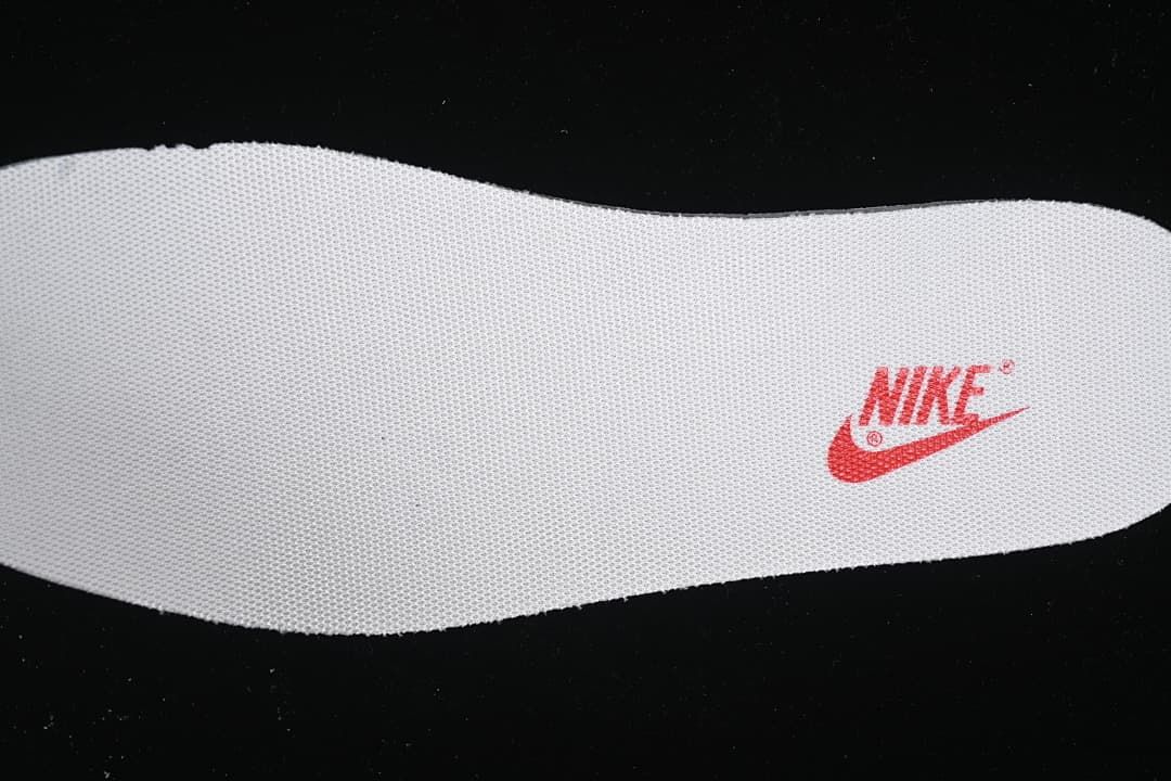 White insole with red Nike branding