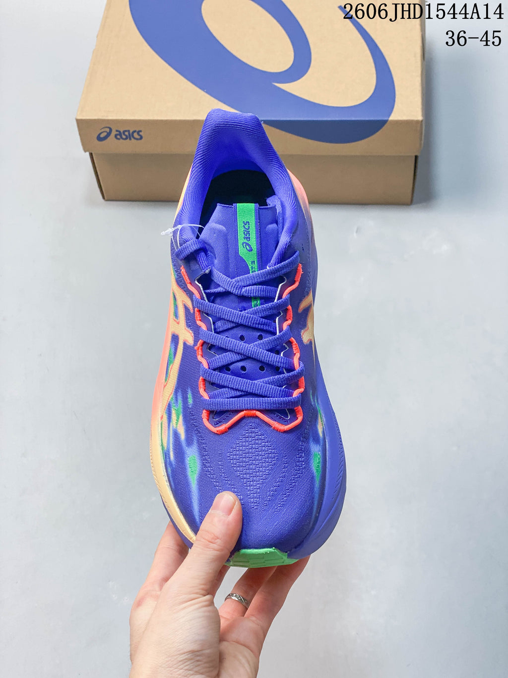 Top view of the purple lace-up running shoe