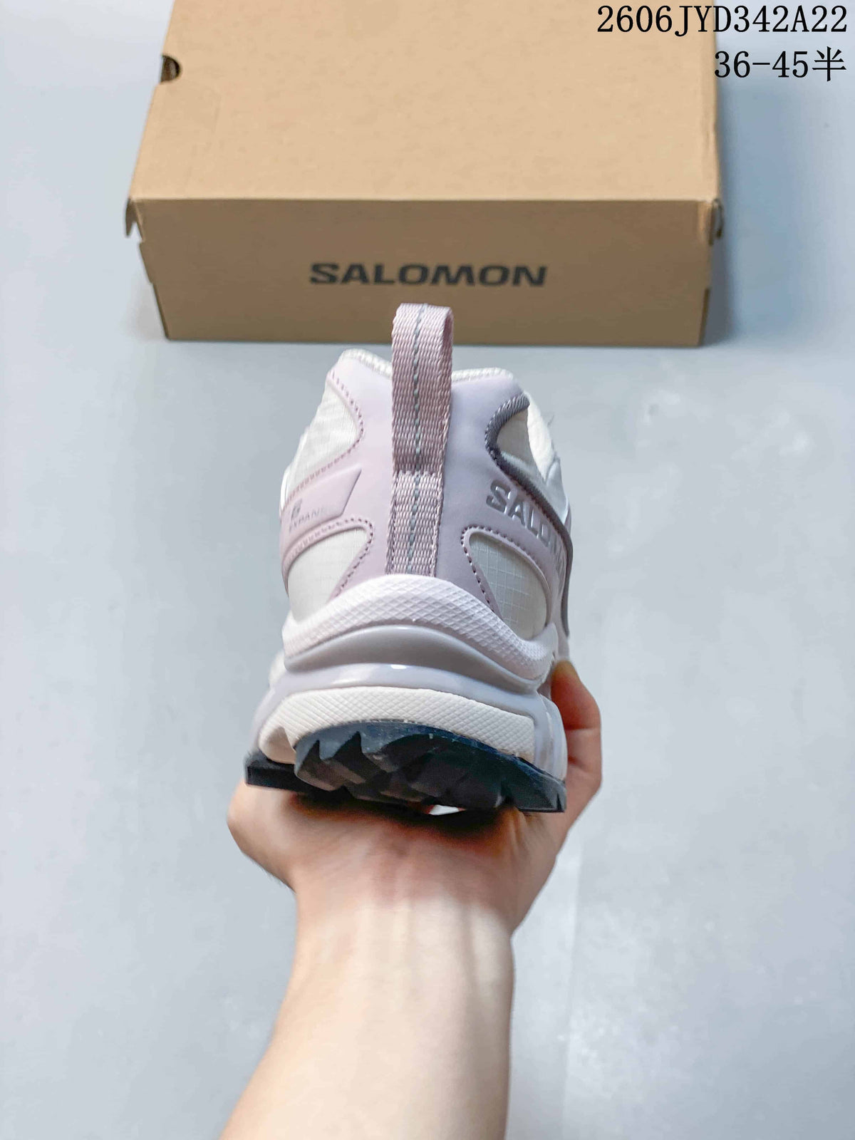 Rear view of the sneaker showing the heel pull loop and outsole