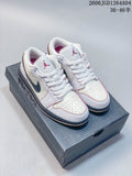 Pair of white Air Jordan 1 Low sneakers with navy and red accents, shown on a shoebox