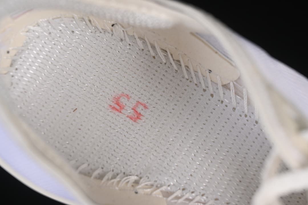 Close-up view inside the shoe showing the insole and stitching
