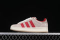 Side view of light neutral Adidas Campus 00s sneakers with red stripes and cream sole