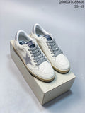 Pair of white Golden Goose Super-Star style sneakers with silver glitter star details and gray laces