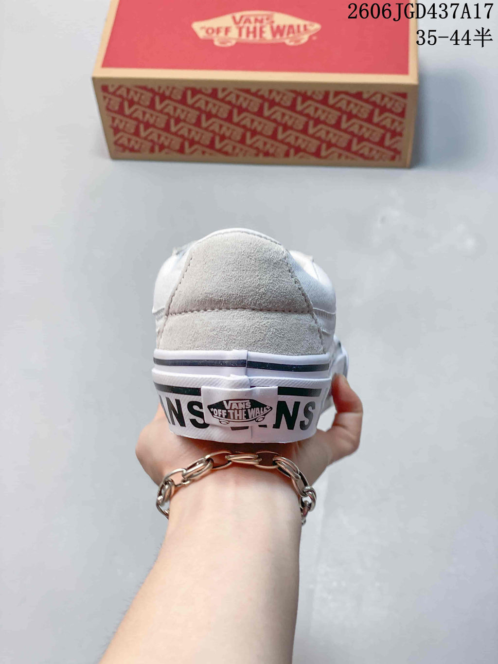 Rear view of the sneaker with Vans lettering printed along the sole.