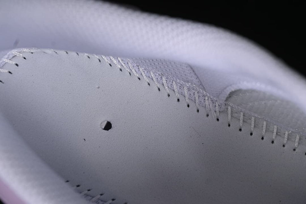 Detail of the stitched upper and perforations