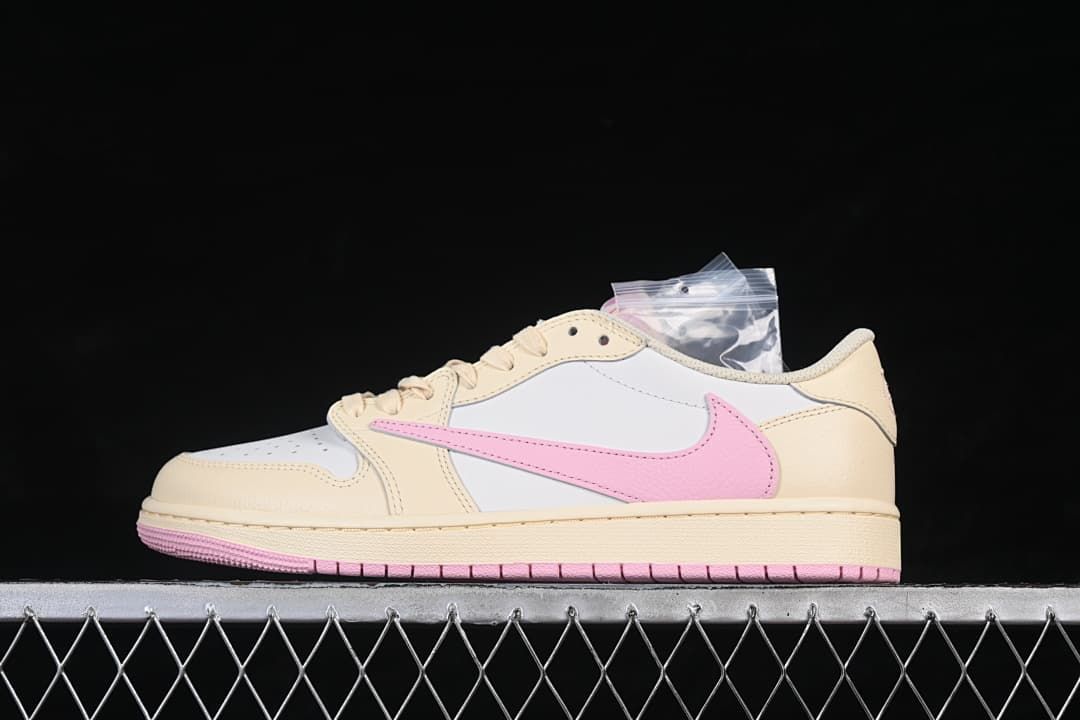 Side profile of a cream and white Jordan 1 Low sneaker with a pink Swoosh and pink outsole