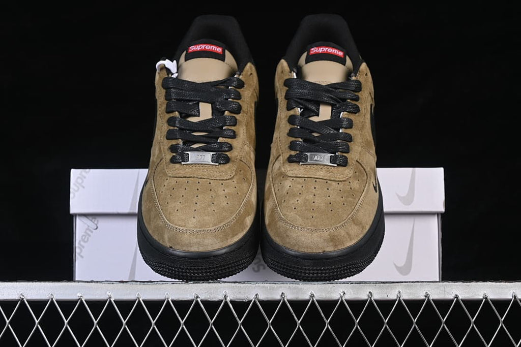 Front view of the pair with perforated toes and black laces
