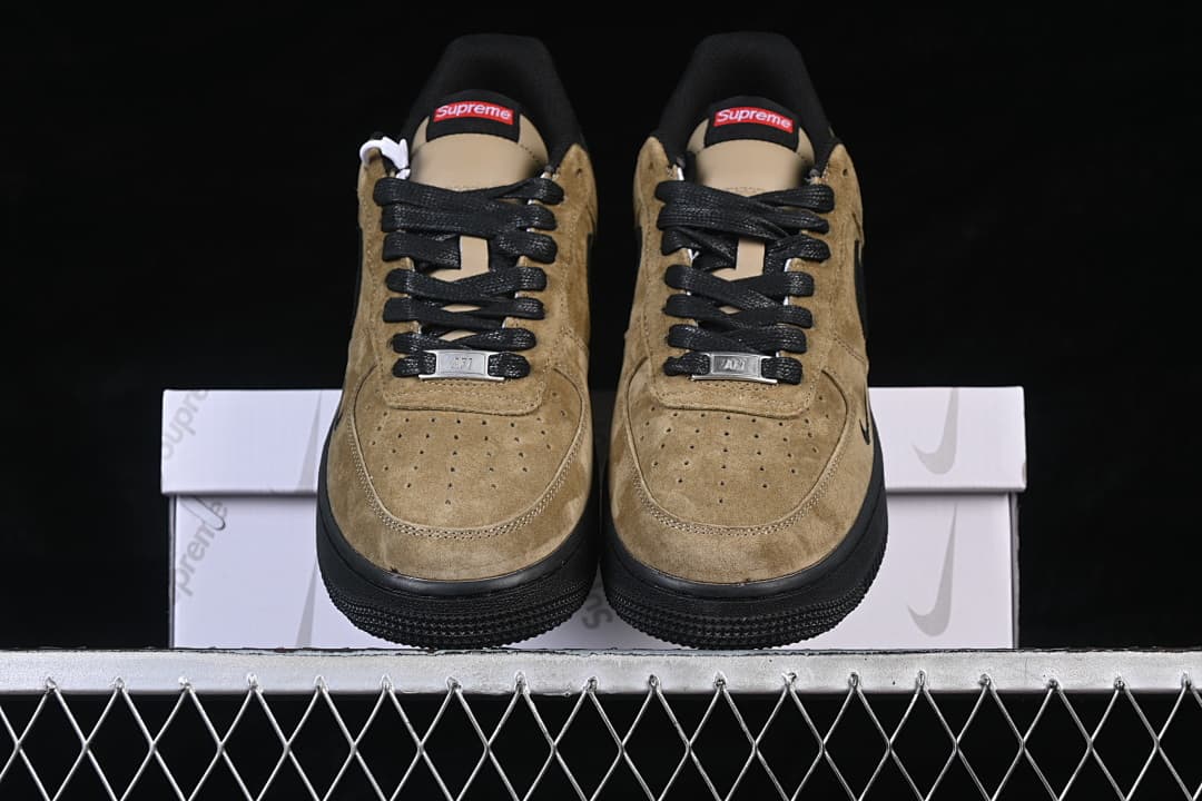 Front view of the pair with perforated toes and black laces