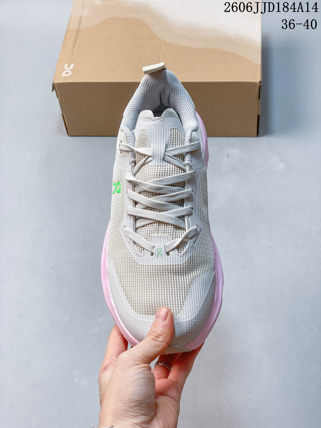 Top view of the lace-up sneaker with a mesh-look upper