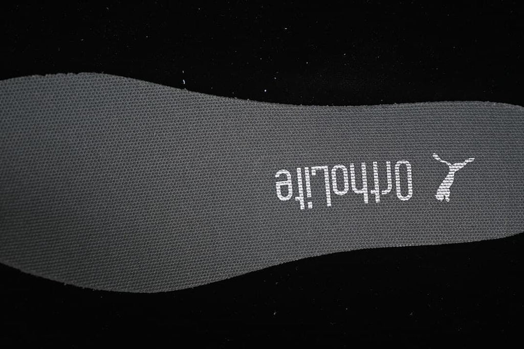 Close-up of the insole with Puma and The Open Product branding