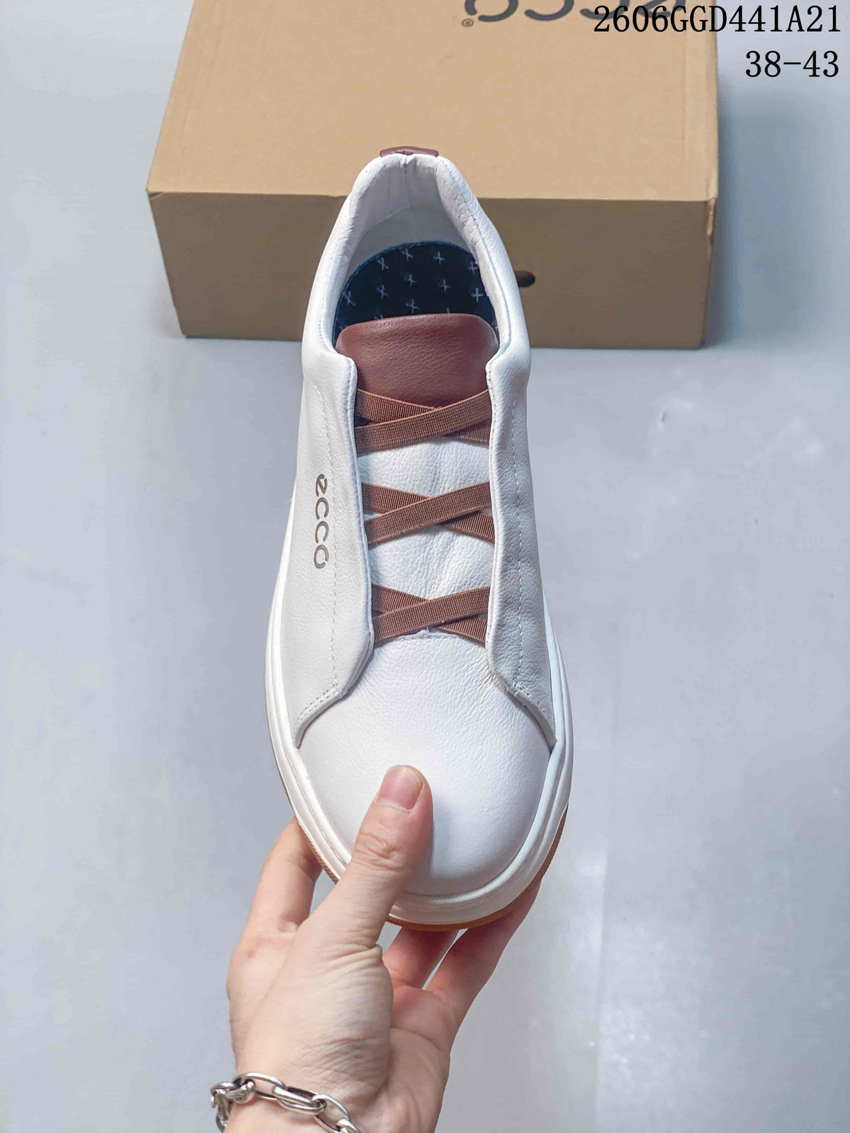 Top view of the sneaker showing elastic cross-over straps and a white upper.