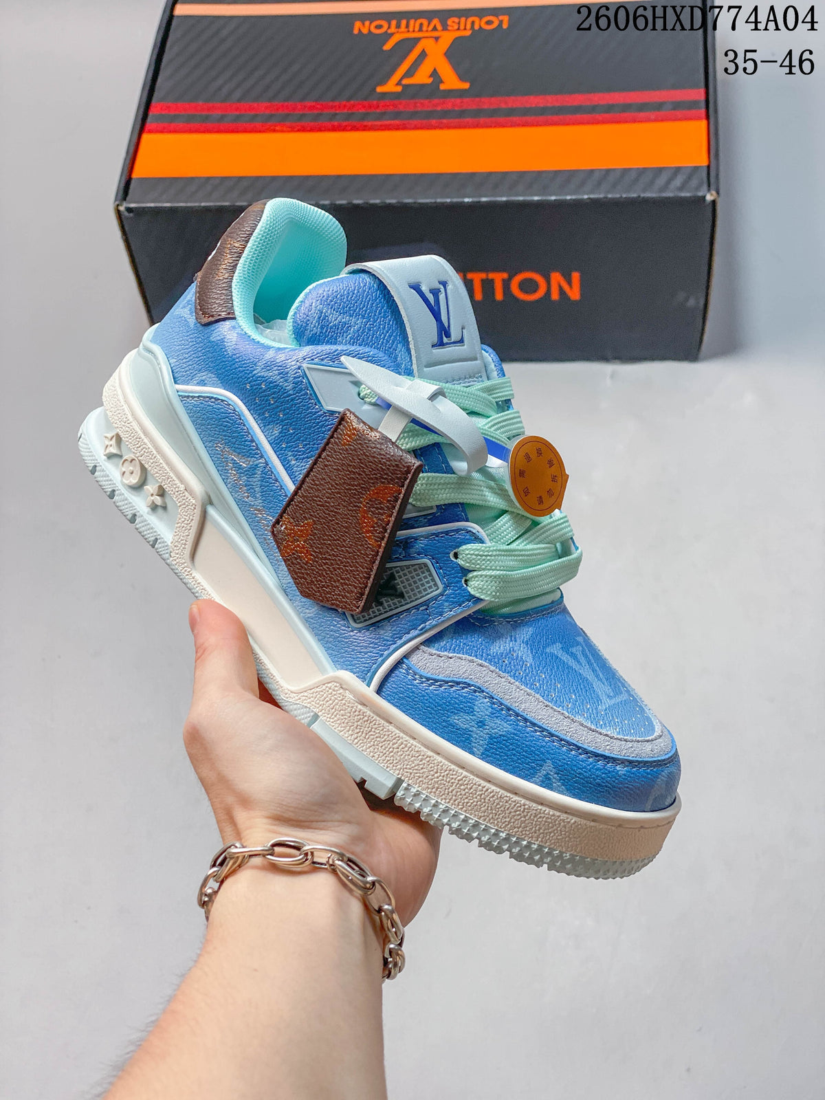 Several colorways of LV Trainer-style sneakers arranged together