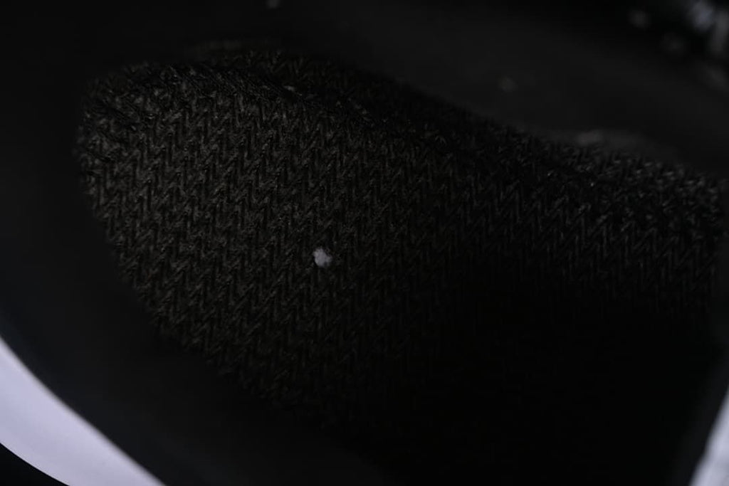 Close-up of the textured black shoe lining.