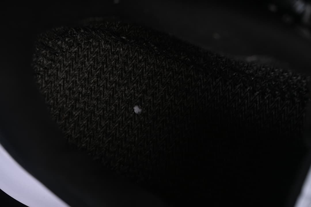 Close-up of the textured black shoe lining.