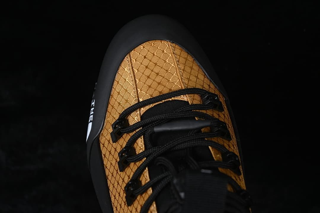 Top-down view of the patterned toe and black laces