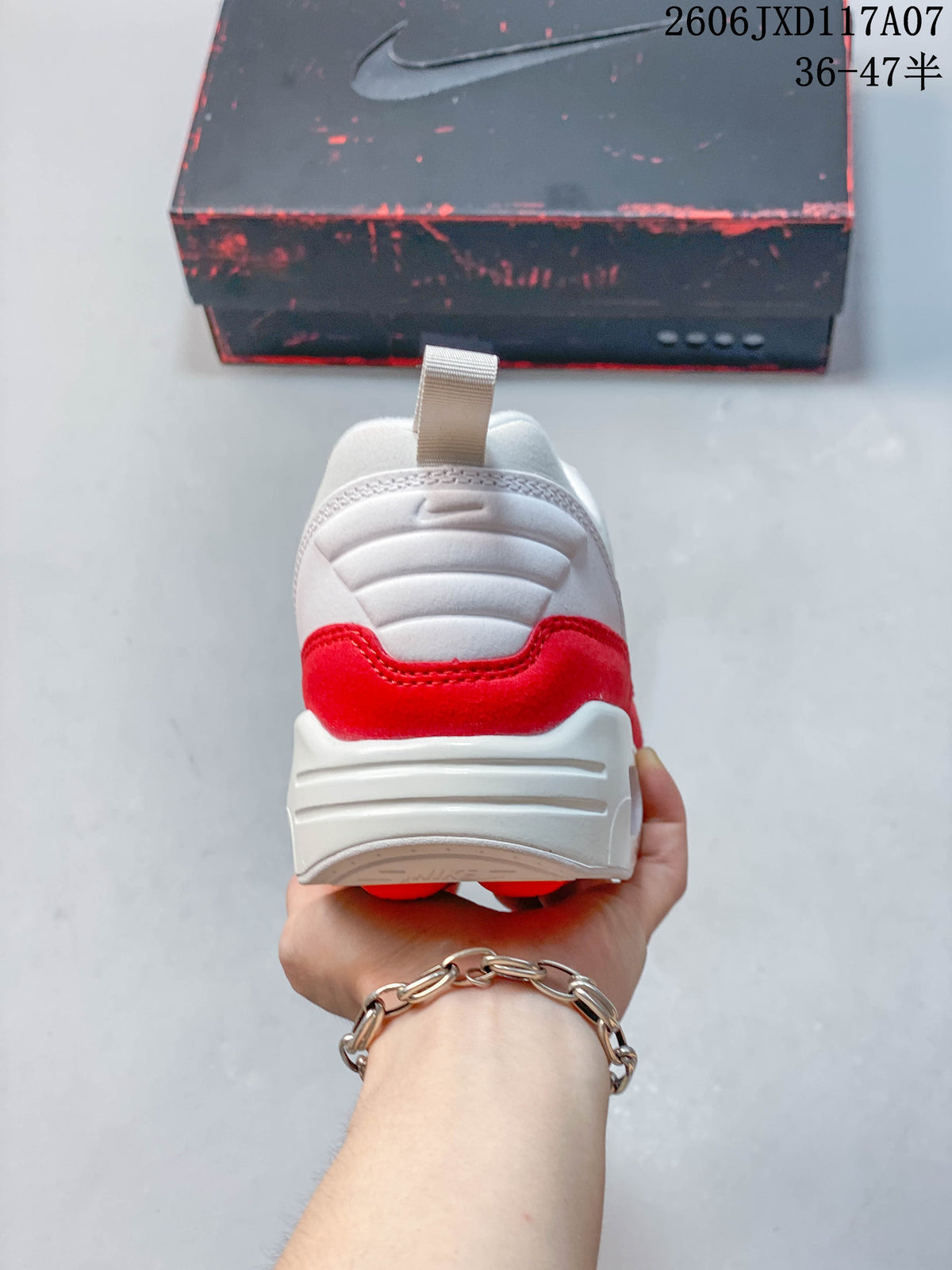Rear view of the white and red Nike Air Max 1 sneaker