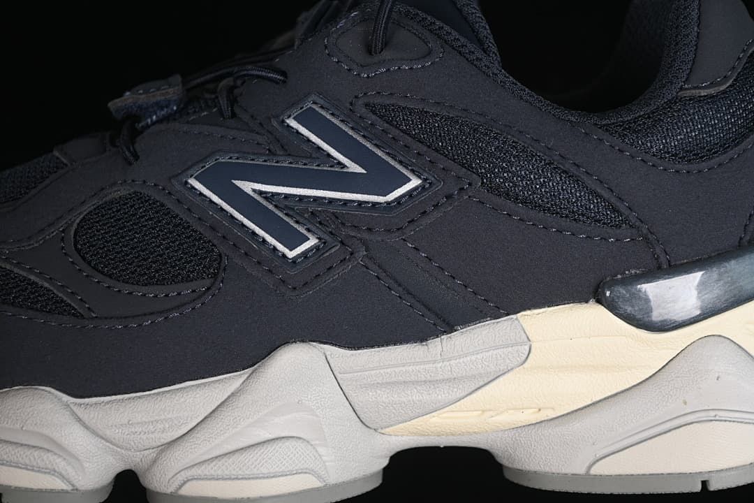 Close-up of the side logo, mesh panels and sole