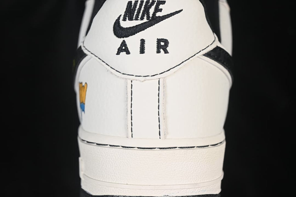 Close-up of the white heel panel with black Nike Air branding