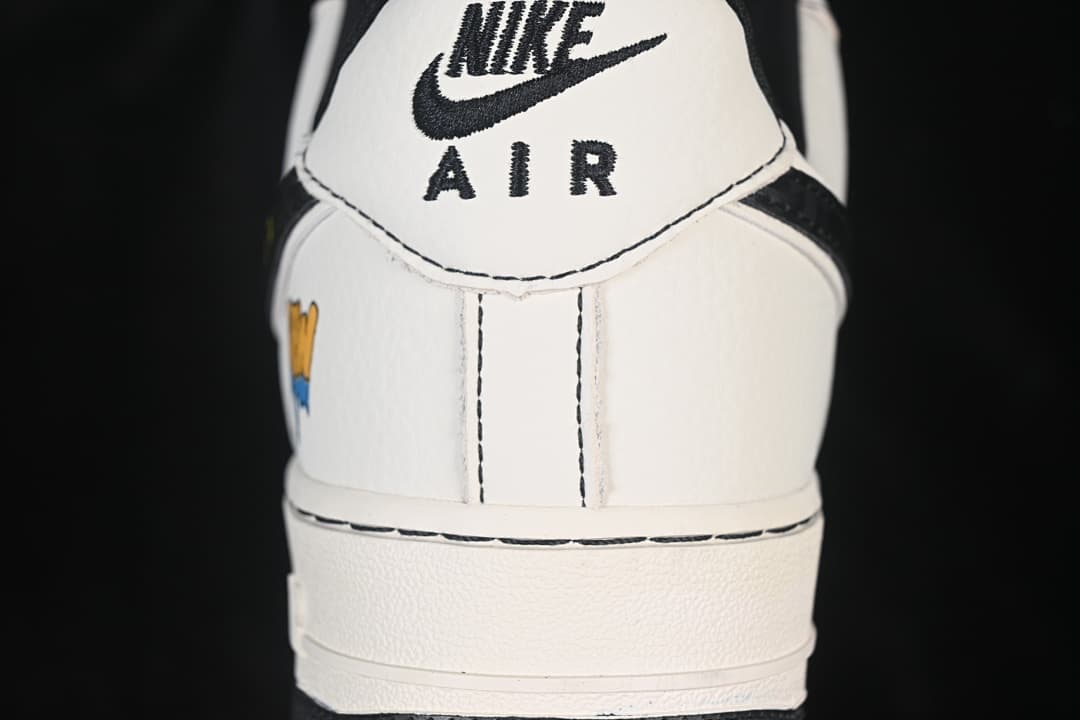 Close-up of the white heel panel with black Nike Air branding