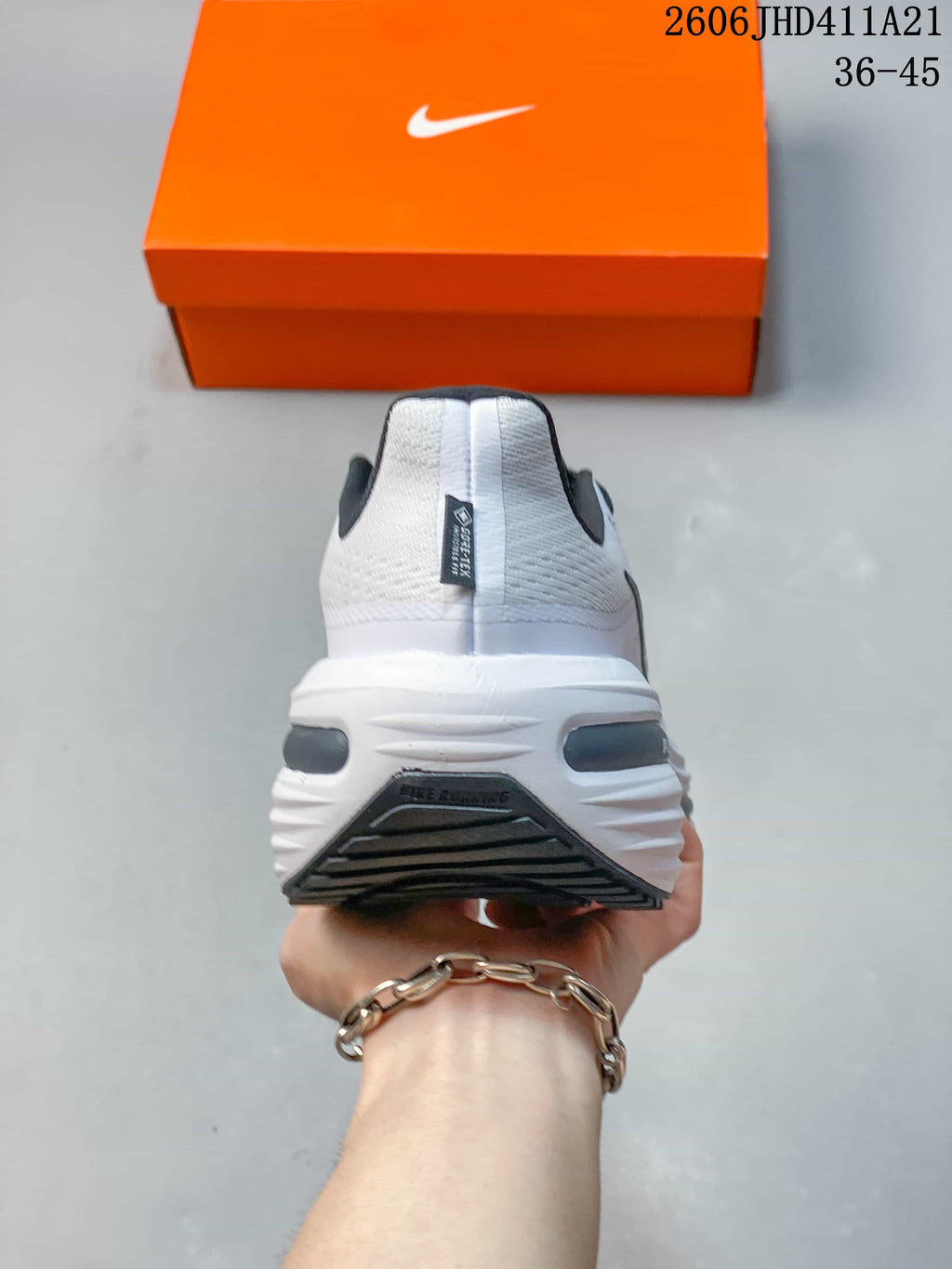 Rear view of a Nike Air Zoom Winflo 12 shoe showing the heel and sole