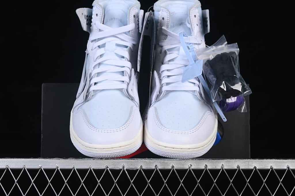 Front view of the white high-top sneakers and included laces