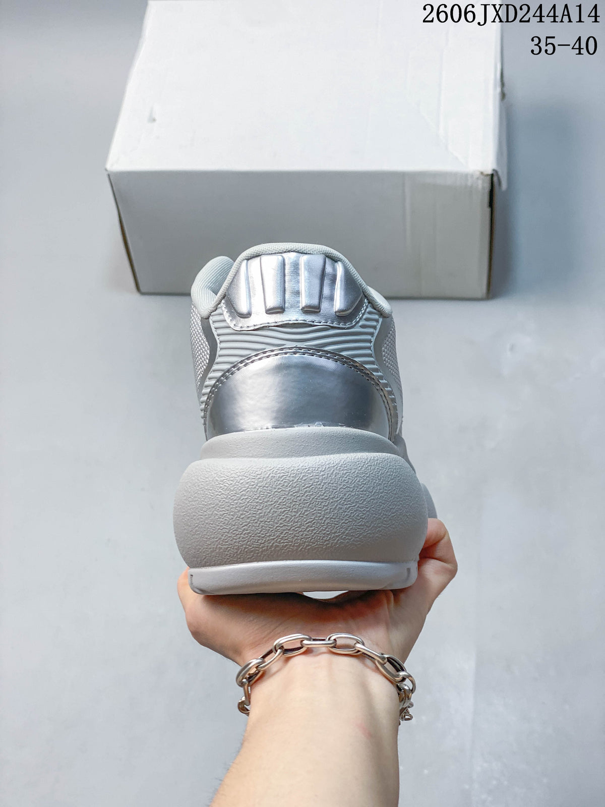 Rear view showing metallic-look heel accents and a chunky sole