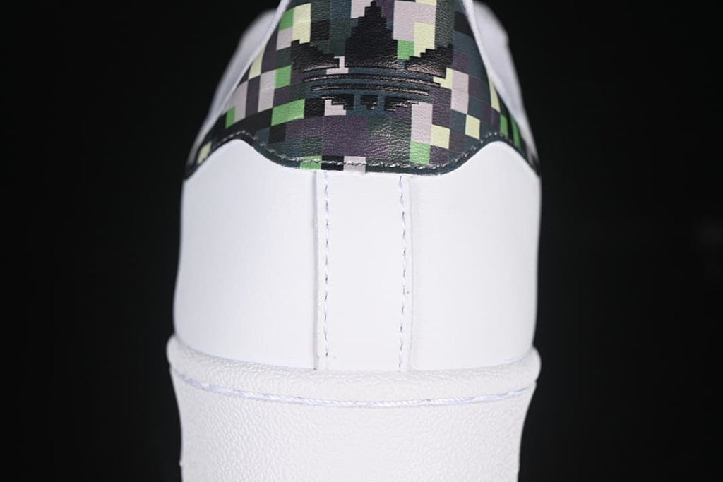 Rear close-up of the sneaker with a pixel-patterned heel panel