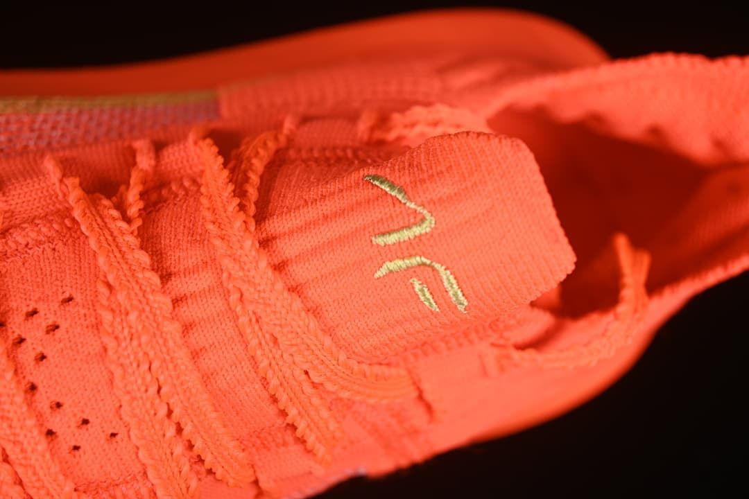 Close-up of the shoe tongue and lace area