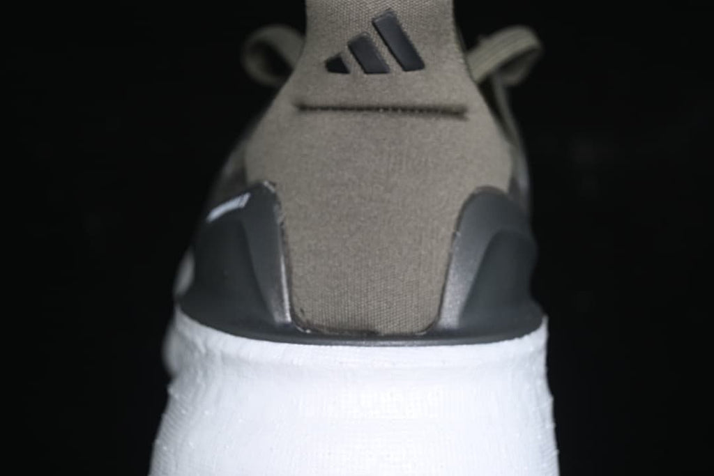 Rear view showing the heel, pull tab, and white midsole