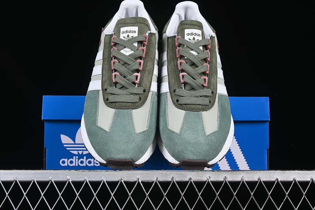 Front view of the pair displayed on a blue shoe box