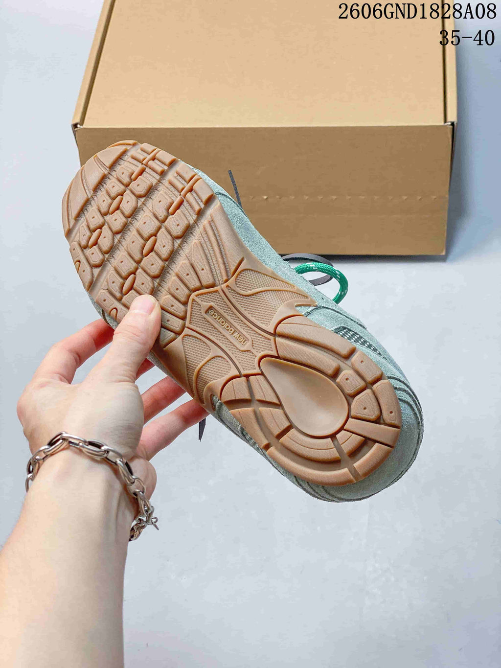 Close-up of the sneaker's gum-colored tread outsole.