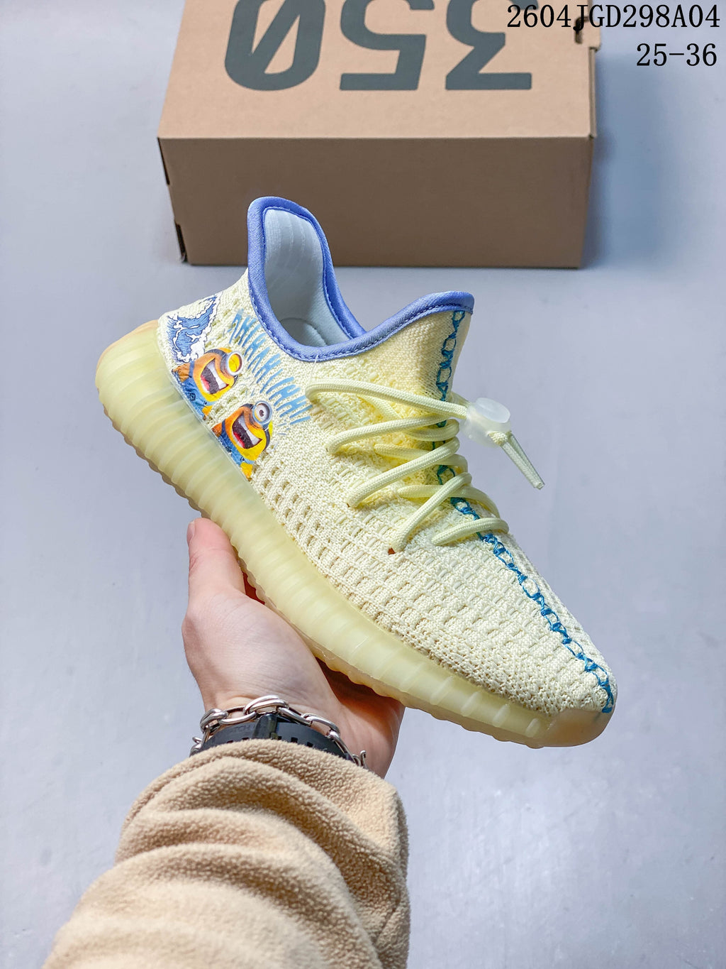 Angled side view of the sneaker showing the blue collar trim and character graphics