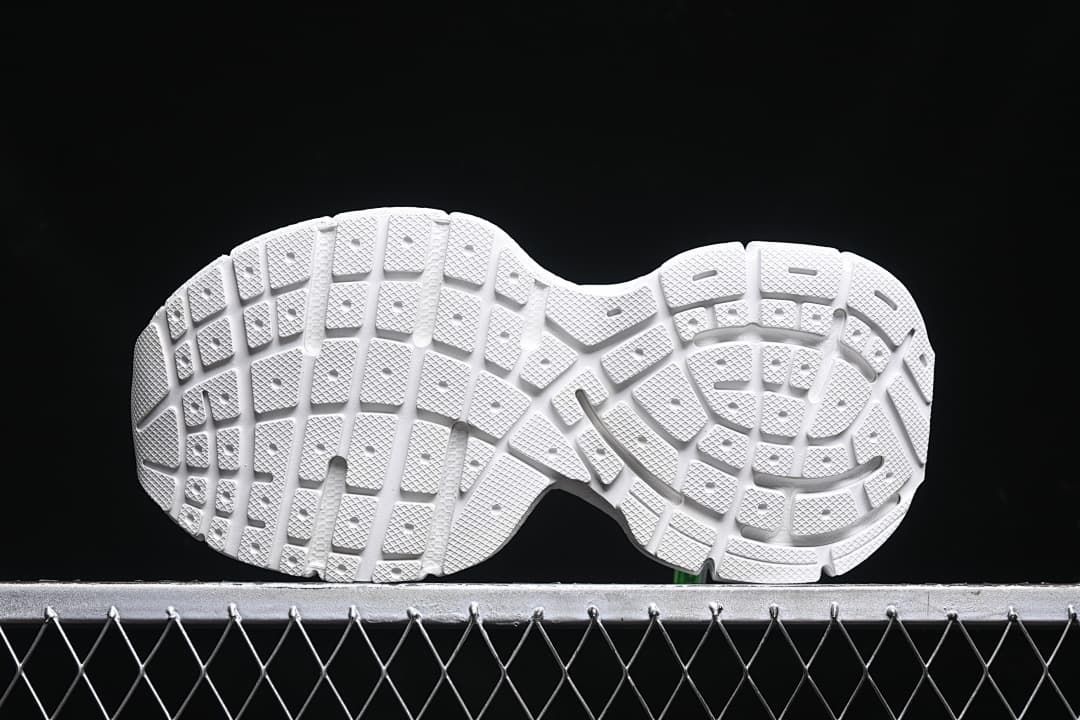 Underside view showing the patterned tread.