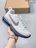 White Nike Air Max Dawn sneaker with gray accents and a dark blue-toned sole