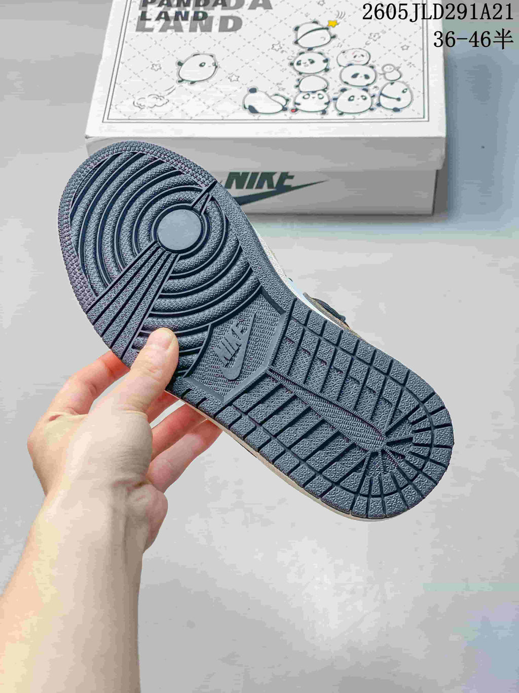 Close-up of the dark outsole tread on a low-top sneaker