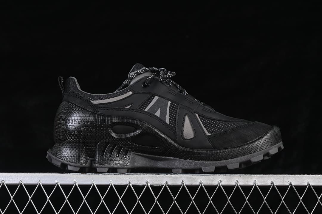 Side profile showing grey accents and trail-style sole