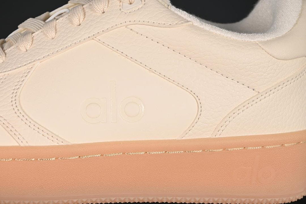 Close-up of the side panel, textured overlays, and embossed Alo logo