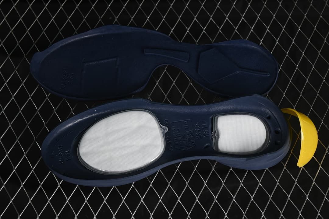 Underside views of the shoe and its insole.