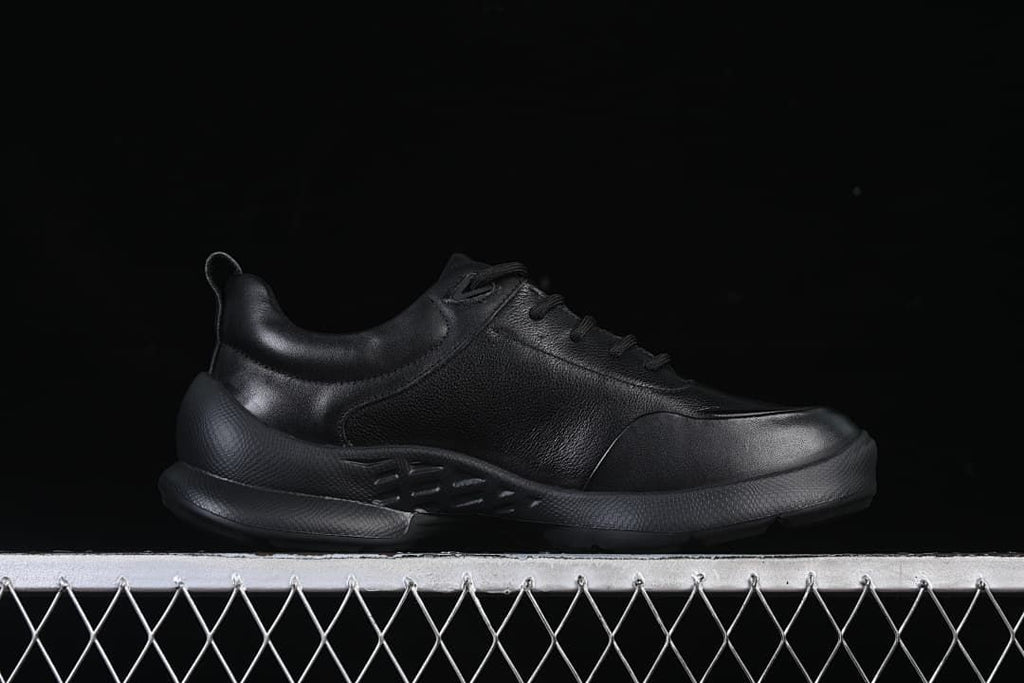Side profile showing the low-cut upper and sculpted outsole