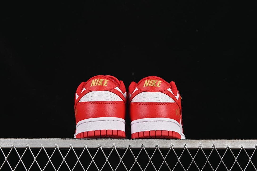 Rear view of the pair showing gold Nike heel logos