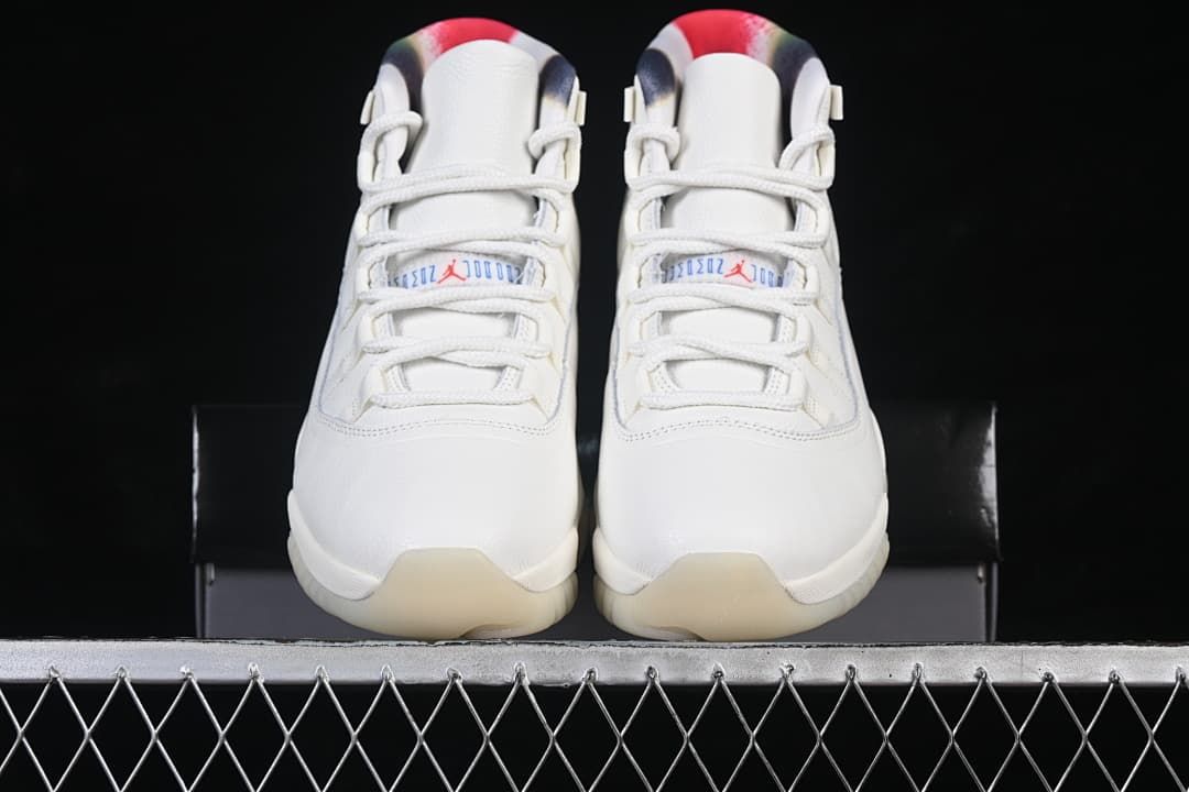 Front view of the pair with white uppers and translucent outsoles.
