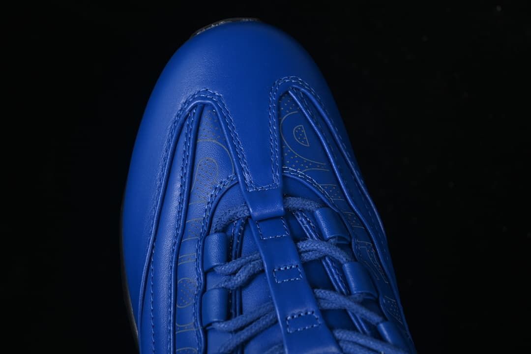 Top view of the sneaker toe, laces, and patterned side panels.